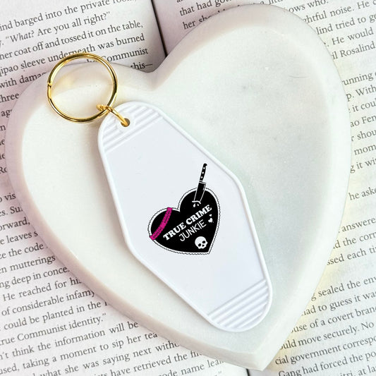 True Crime Junkie Motel Keychain for Mystery and Crime Book Lovers