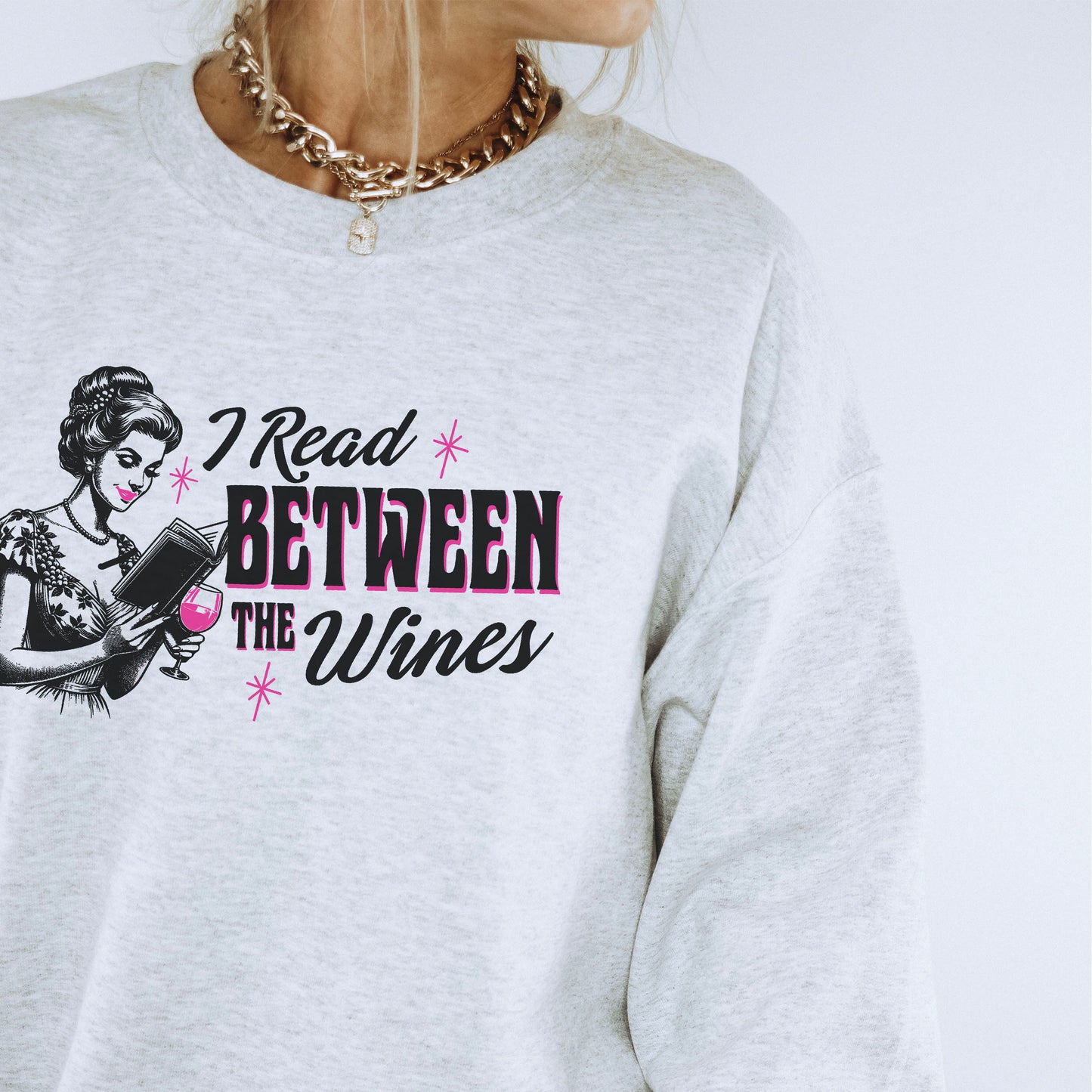 I Read Between The Wines Gildan Crewneck Sweatshirt