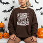 Welcome to the Bookstore Gildan Crewneck Sweatshirt