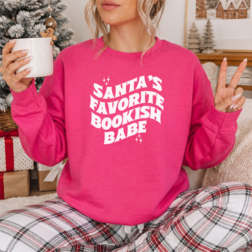 Santa's Favorite Bookish Babe Gildan Crewneck Sweatshirt